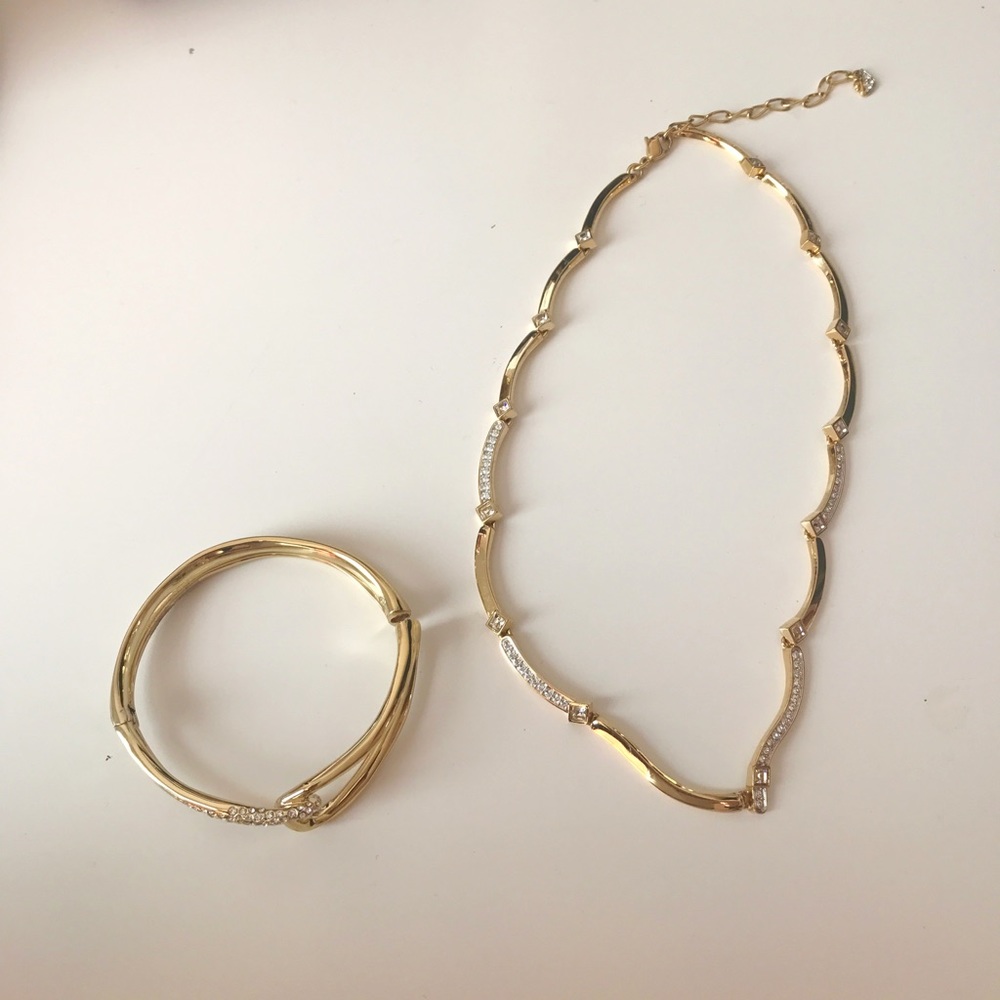 Gold plated necklace and similar type bracelet.